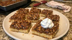 Pecan Pie Bars with Maple and Brown Butter – an easy traybake to slice and share