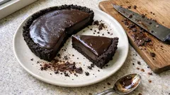 Espresso ganache tart with an Oreo-style crust – rich, glossy and easy to make ahead