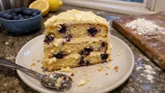 Blueberry lemon layer cake with zesty buttercream – light, bright and easy to slice