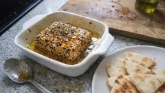 Honey sesame baked feta with warm pitta