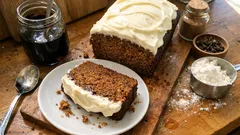 Moist Gingerbread Loaf Cake with Cream Cheese Frosting — a cosy, sliceable bake