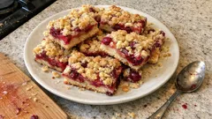 Fresh Cranberry Crumble Bars – a buttery shortbread traybake with a zingy finish