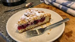 Sour cherry streusel cake with almond crumble – a perfectly sliceable coffee-time bake